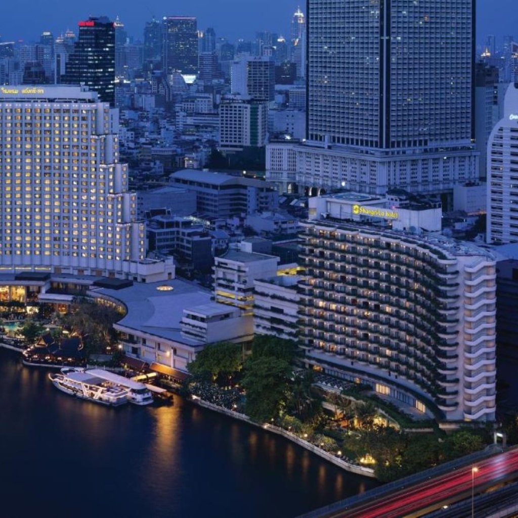 Shangri-La Bangkok riverside hotel exterior adjacent to Saphan Taksin BTS station